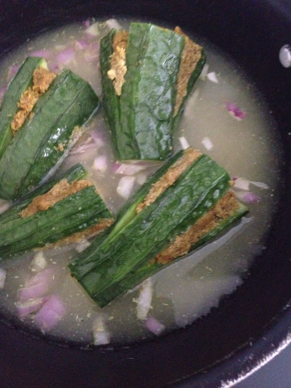 Add water to till they are half submerged into it.