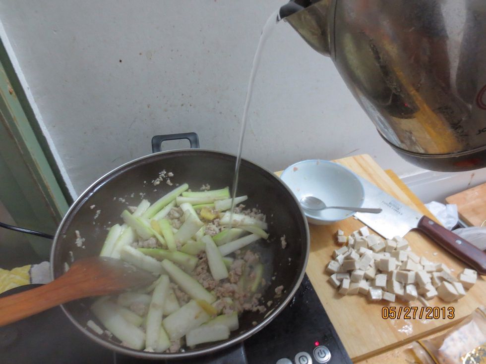 Add water until it covers all the ingredients and an extra inch above the ingredients