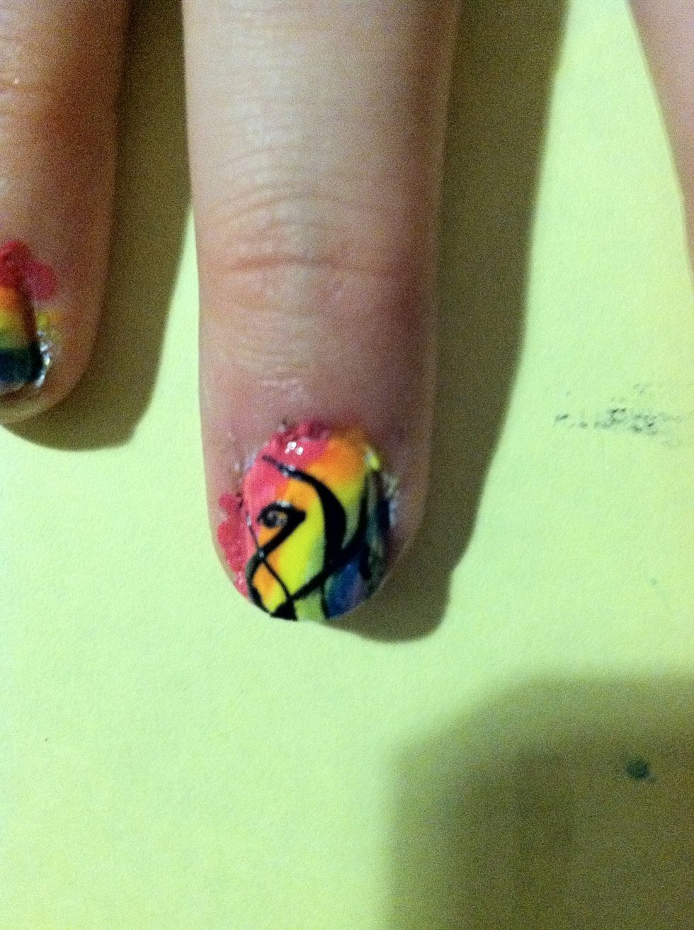 Add wavy lines on the remaining nails.