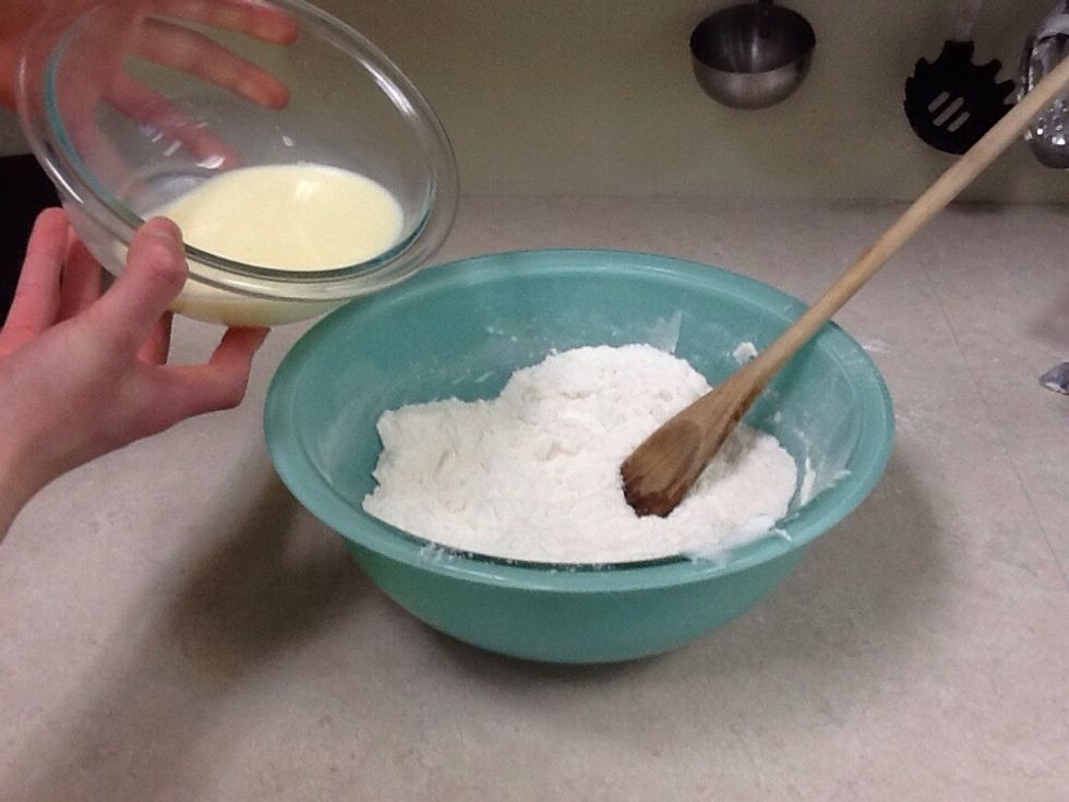 Add wet mixture to dry mixture stir just until moistened