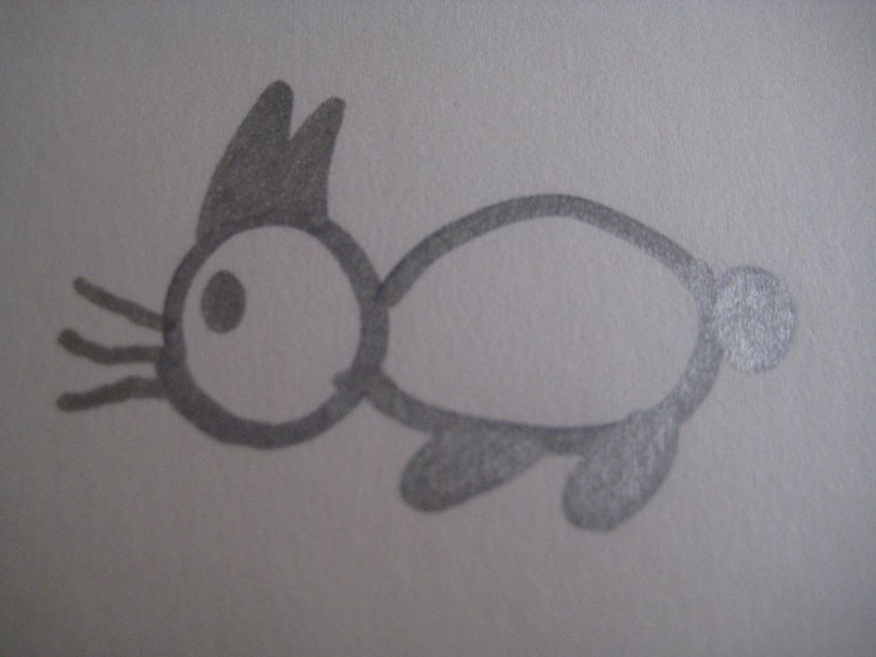 Add whiskers under the eyes and you're done!