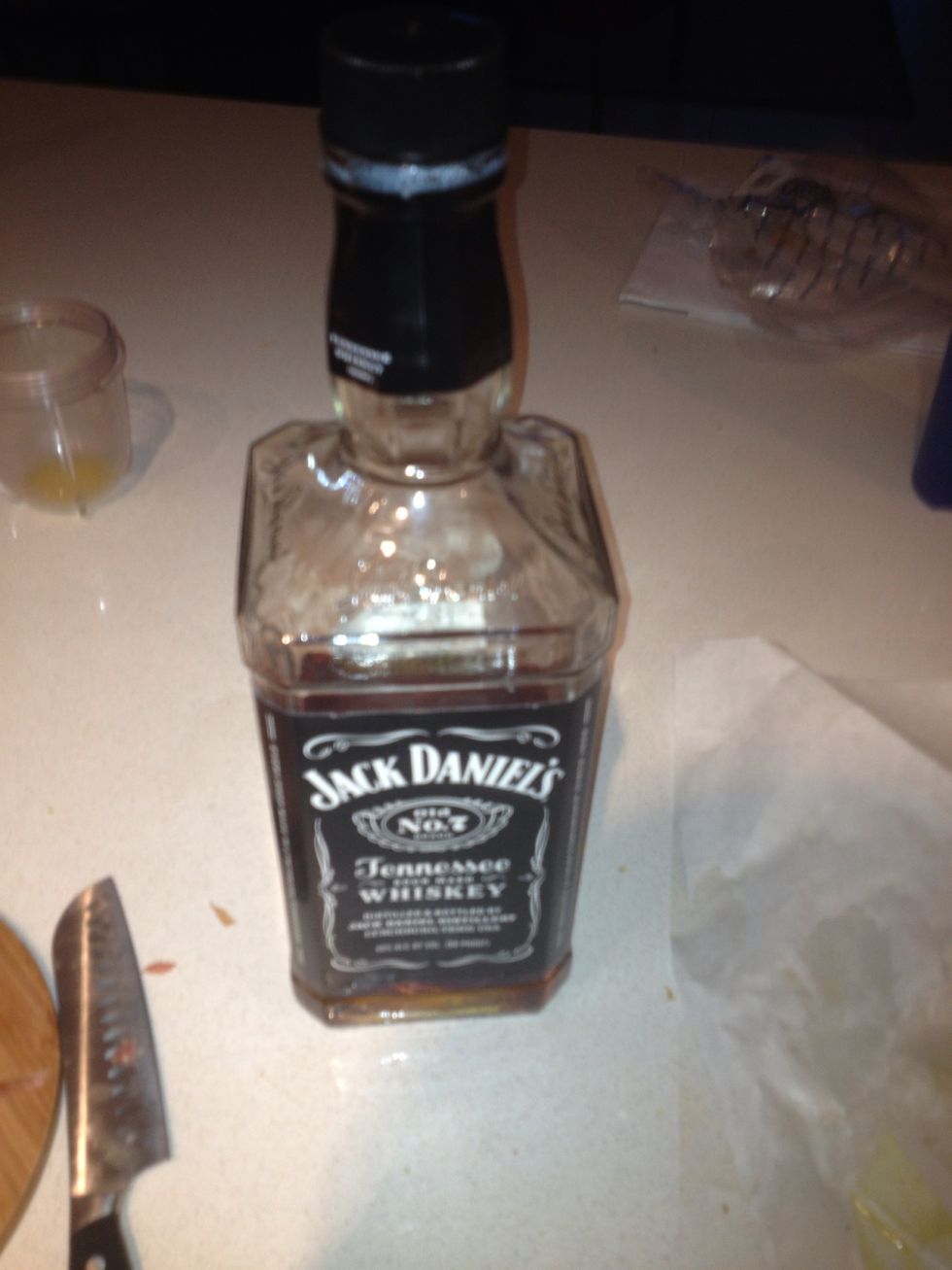 Add whiskey and maple syrup into medium high pan with olive oil. Cook down for 5 min then add brussel sprouts and prosciutto.