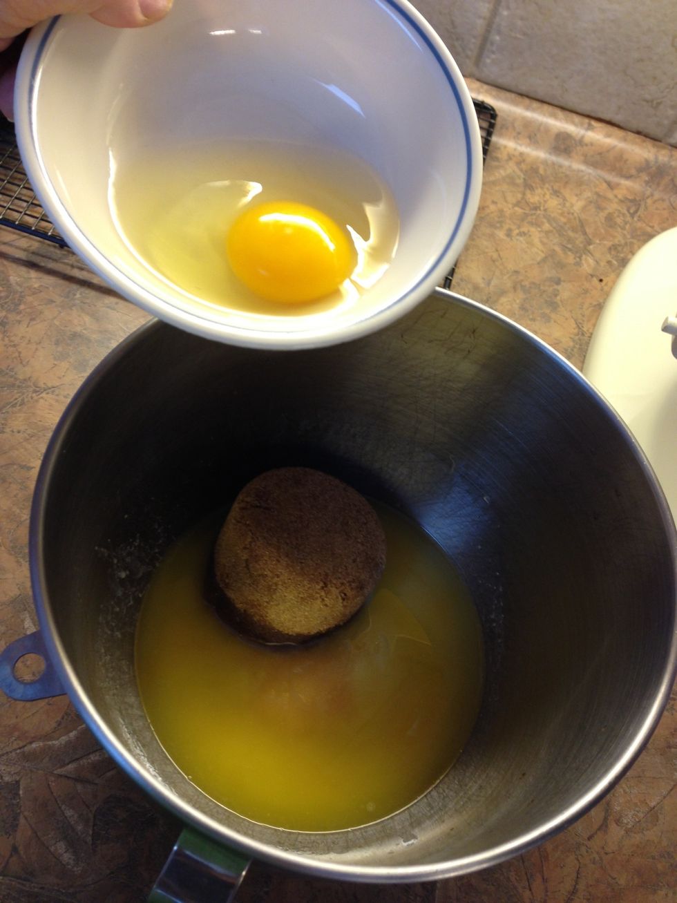 Add white & brown sugars, vanilla. Miix well, while adding eggs and dry ingredients.  Add flour and optional chopped walnuts.