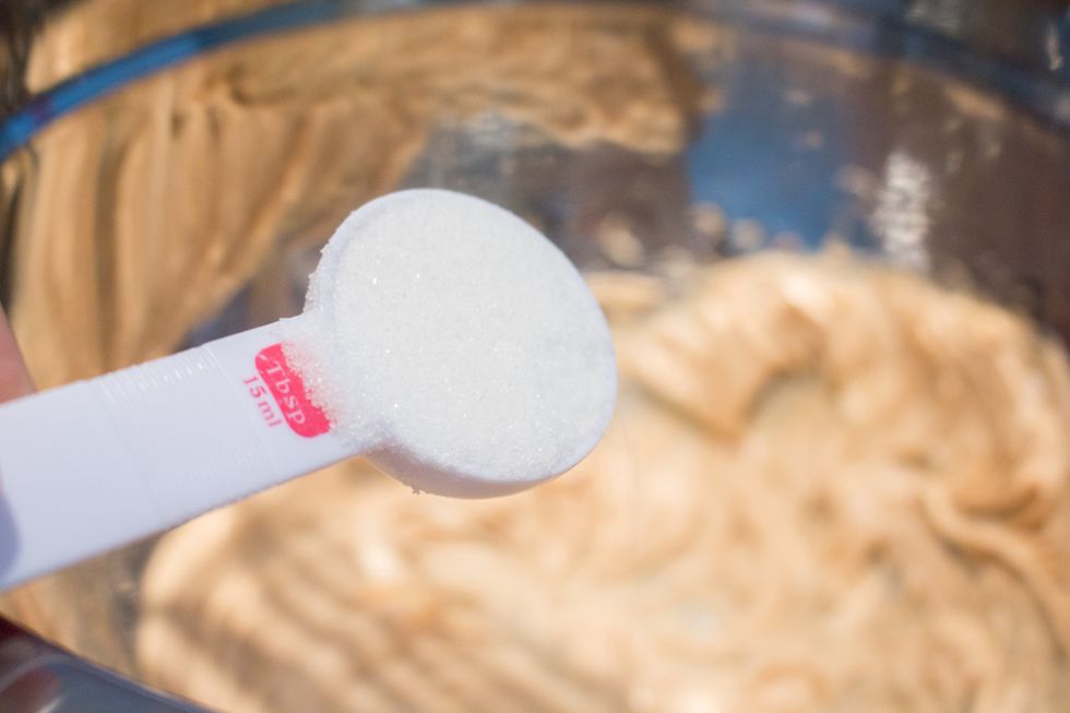 Add white granulated sugar to peanut butter mixture.