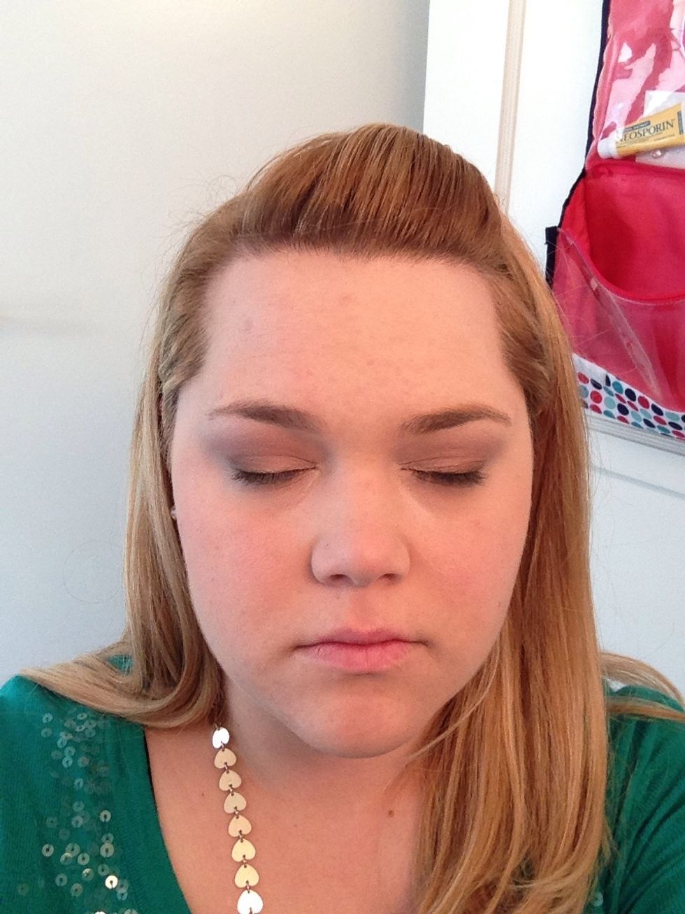 Add white shadow to the very inside of your eye (near the tear duct), the outside corners, and along the brow line.