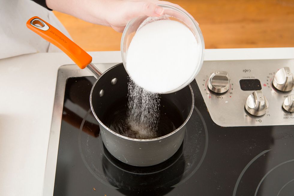 Add white sugar. Simmer on medium-low until both sugars dissolve. It takes a few minutes.
