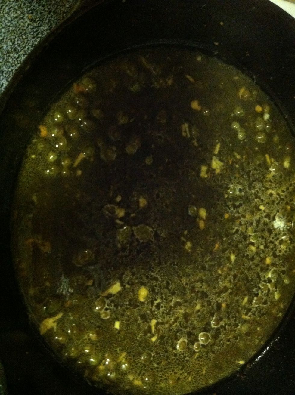 Add wine to deglaze.  Then add chicken broth, half of lemon's juice, honey, and capers. Let simmer until reduced by about half, about 3 minutes.  (Save other half of lemon to slice toward end).