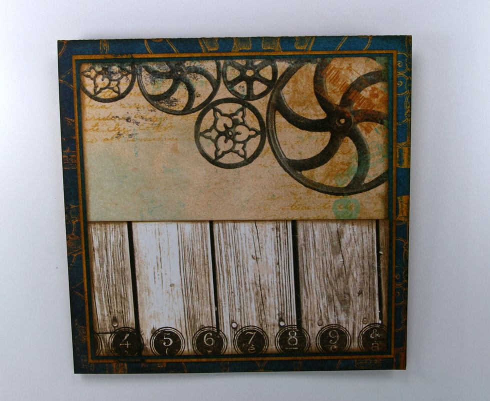 Add wood grain patterned paper cut at 2 3/4 x 4 3/4 inches. Ink edges and attach to bottom of last layer.