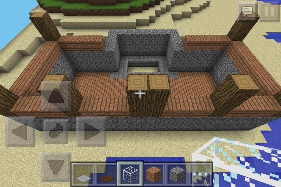 Add wood planks 1 block high between all the logs but be careful at the back.