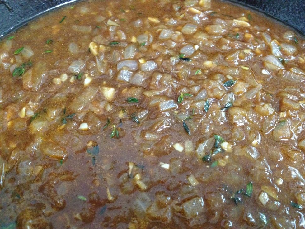 Add worcestshire sauce and tomato paste to the onion mixture.  Stir till everything is well combined then immediately remove from heat and bring to room temperature.