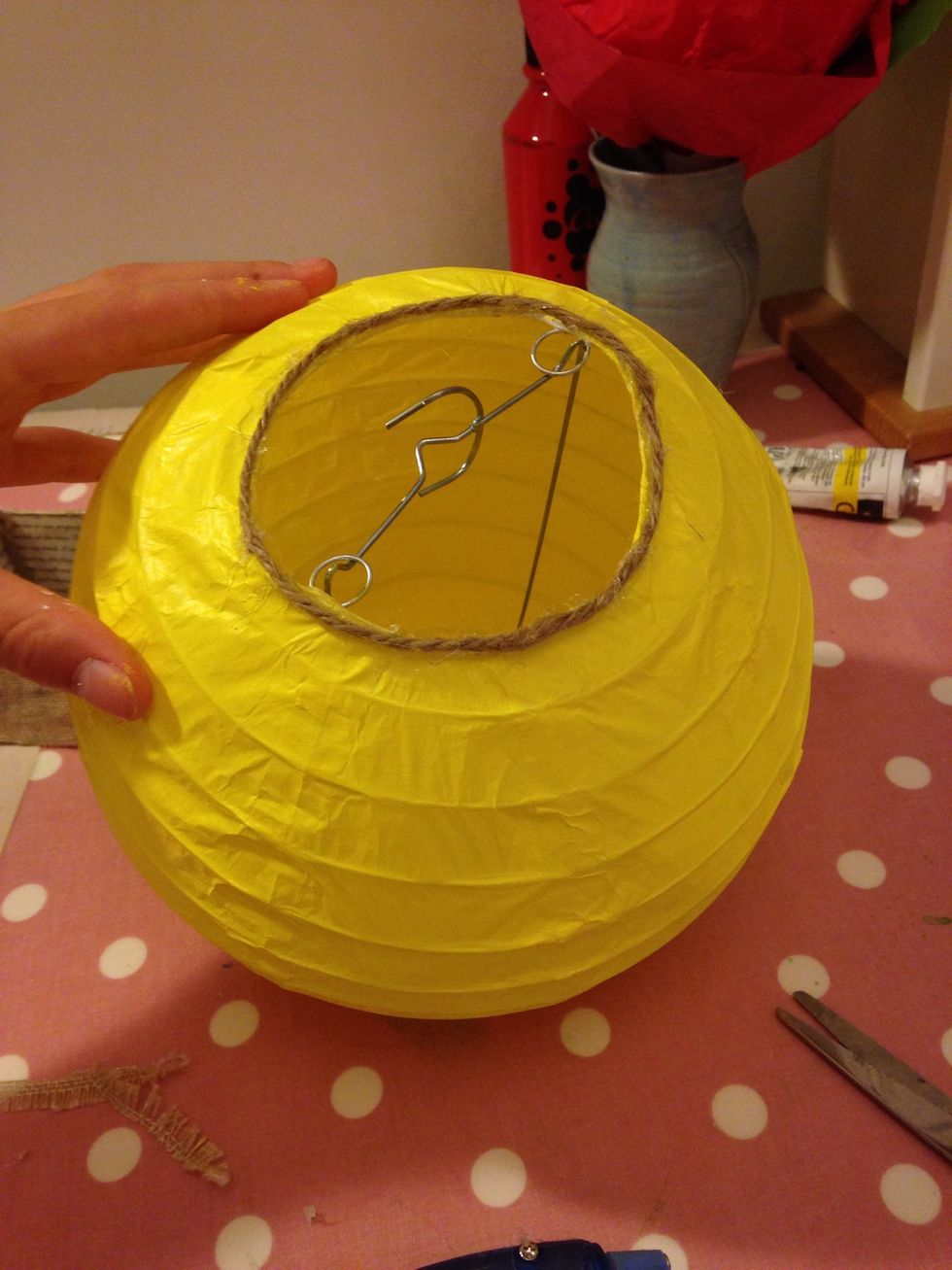 Add yarn to the top of the lantern