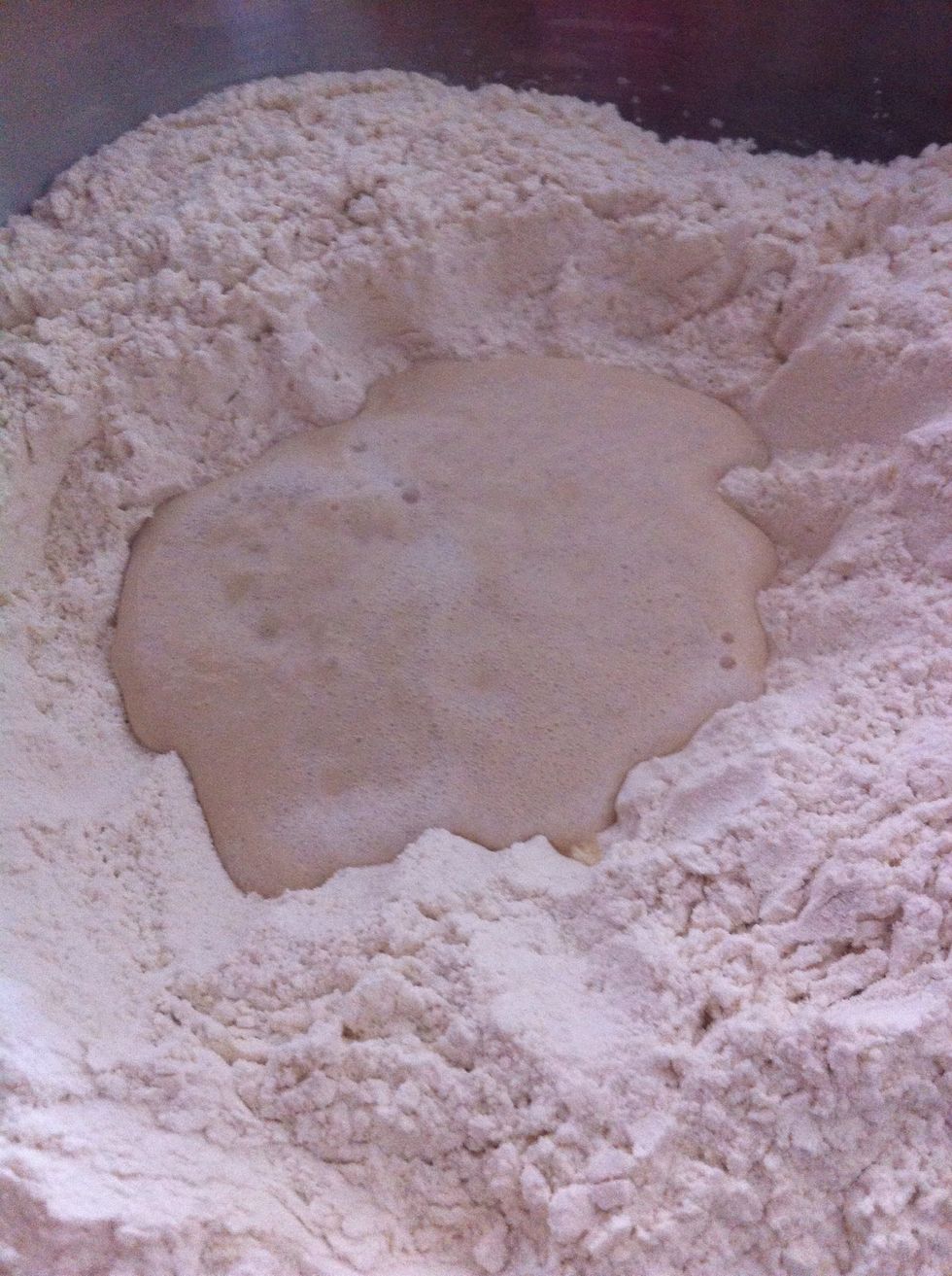 Add yeast mixture to the flour and add salt to taste. (1tbsp.). Add the water.