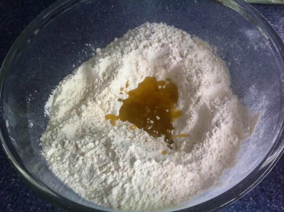Add yeast, salt and Olive Oil to the Flour