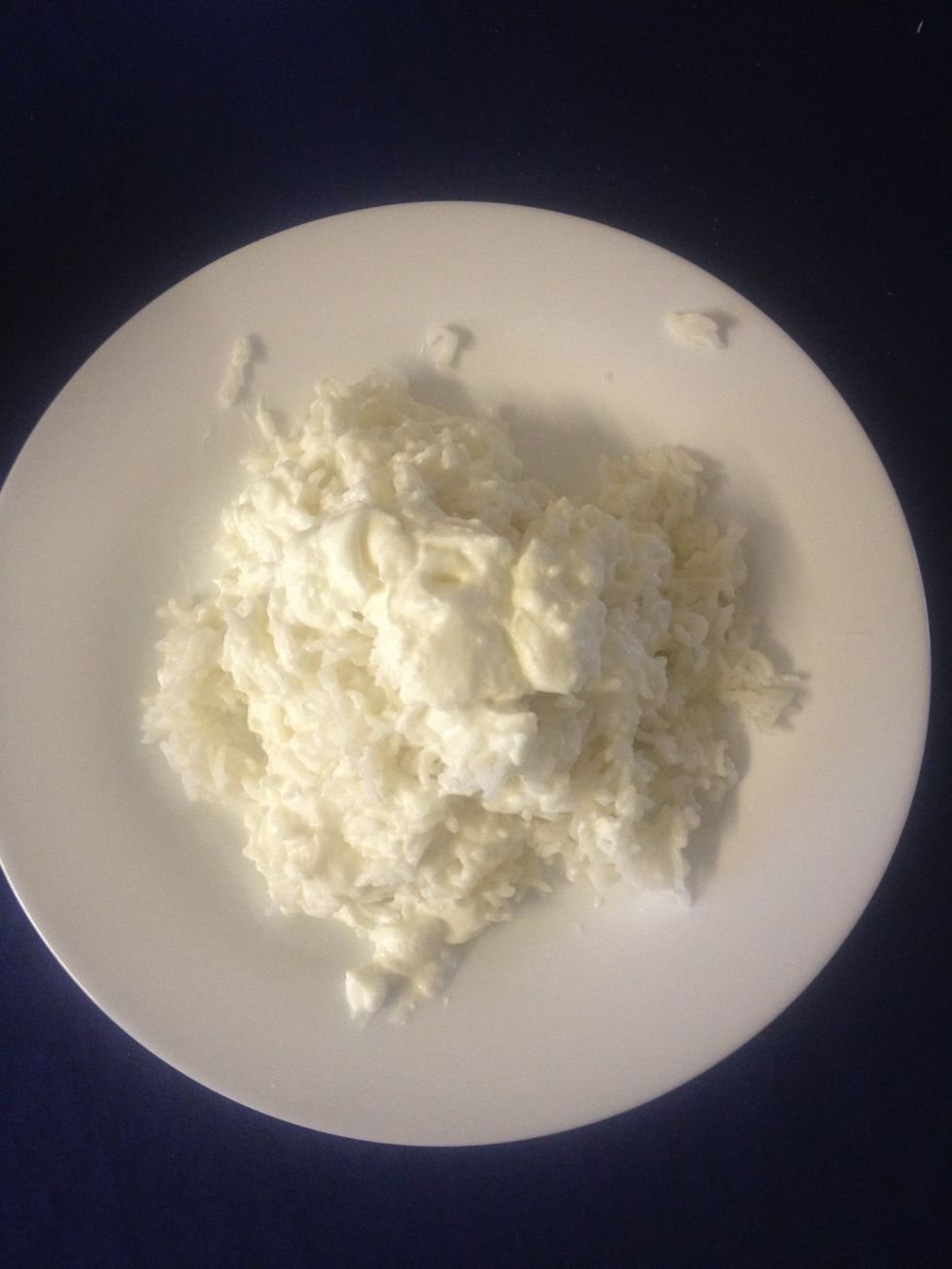 Add yogurt to rice and mix thoroughly with clean hands