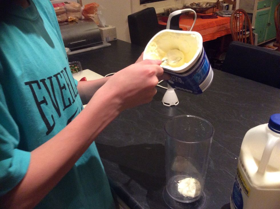 Add yogurt to the cup