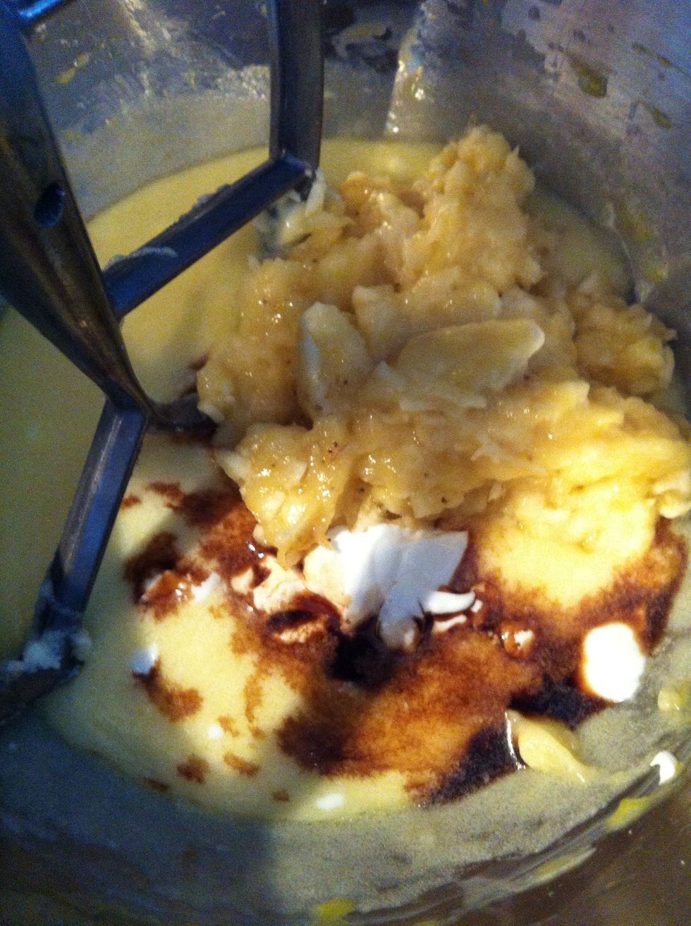 Add yogurt, vanilla extract and mashed bananas (I mashed mine with a fork). Blend well