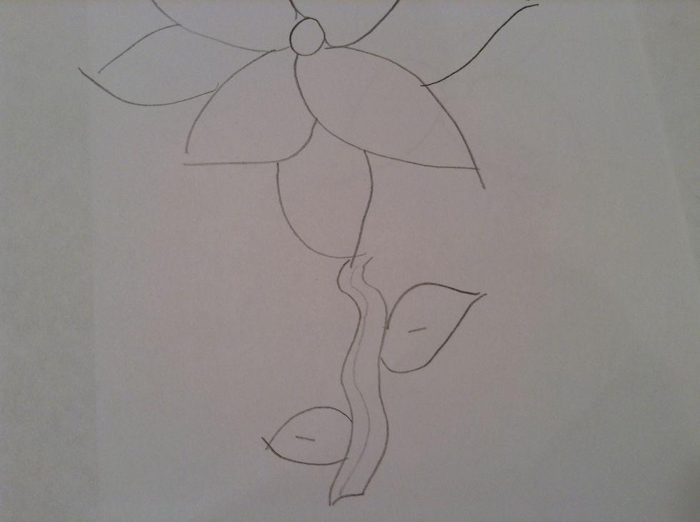 Add you leaves wherever you want on the stem, but make sure you don't add too much or your flower stem would only have leaves.