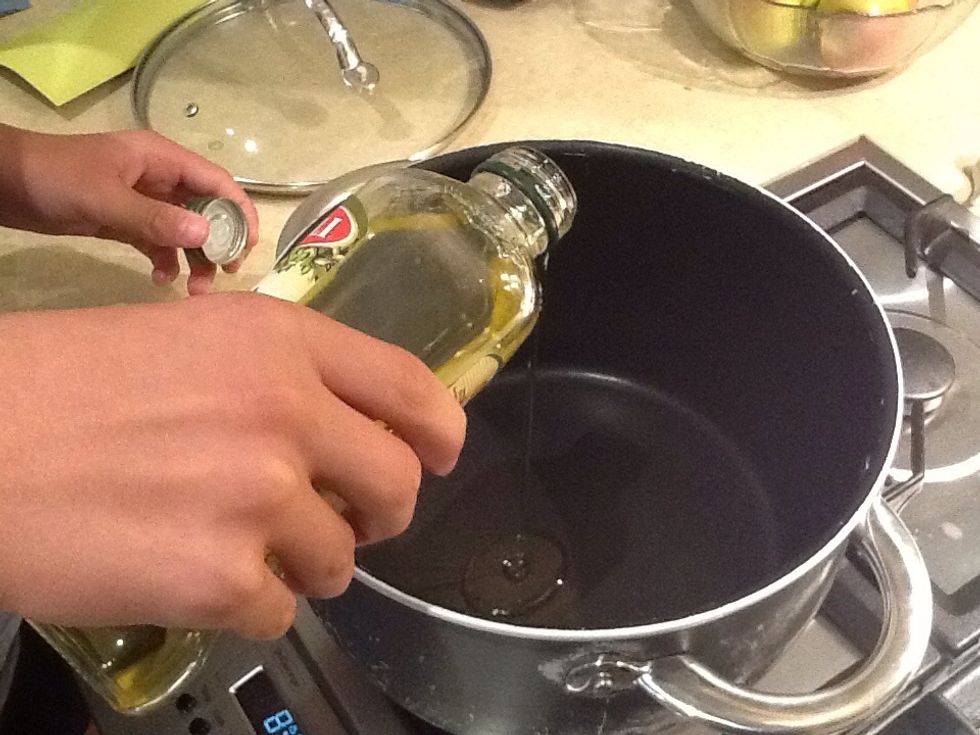 Add your 2 Ts of olive oil to the pot (heat oil in pot and don't let it burn)