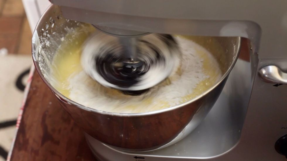 Add your 4 cups of flour one cup at a time. Unless you want to wear a coating of flour all over your face. Alright we are done once your mix is done. Now repeat all steps 1-10 for second cake.