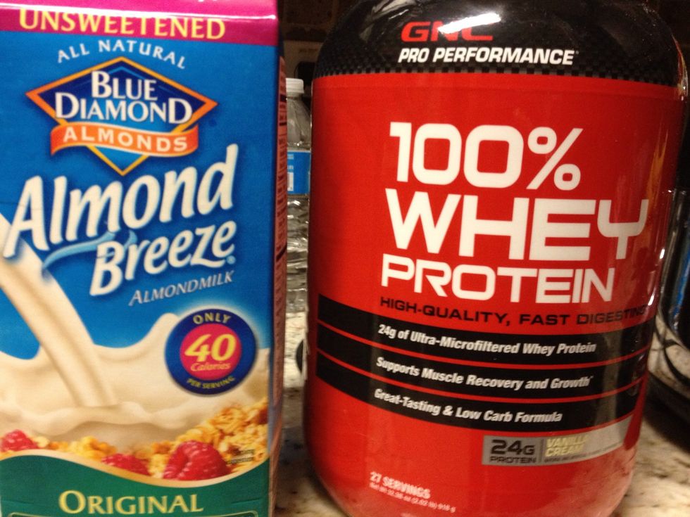 Add your almond milk and protein into the blender.