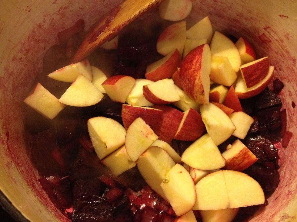 Add your apple wedges to the pot and stir