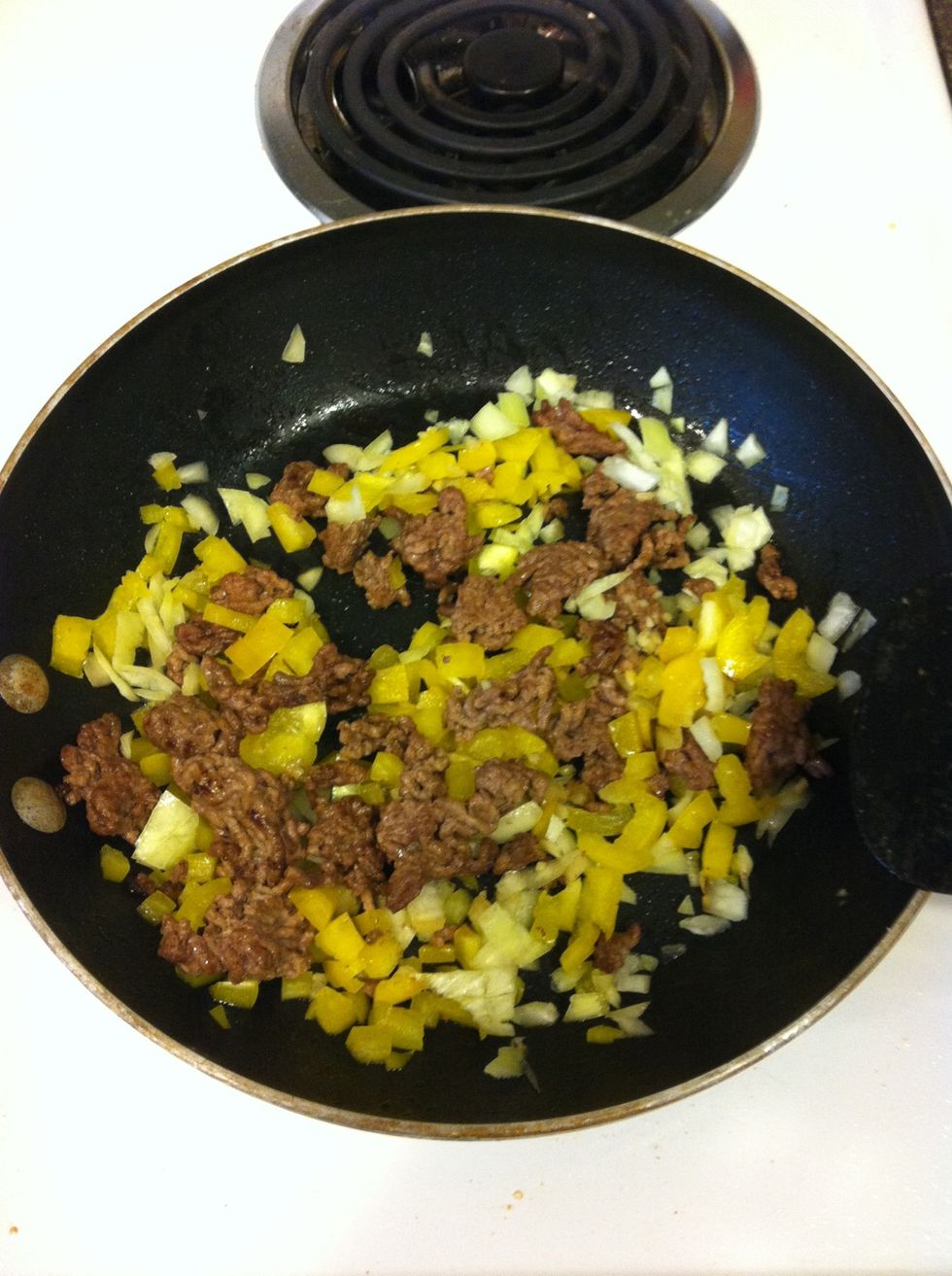 Add your bell pepper (I only like yellow but you can use red or green too) and onion until veggies are tender- about 3 mins.