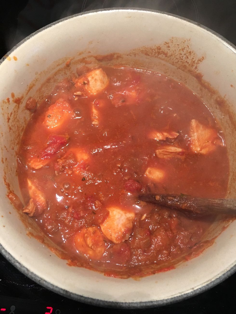 Add your chicken and half cup or so of water. Cook on low for 20 odd minutes covered