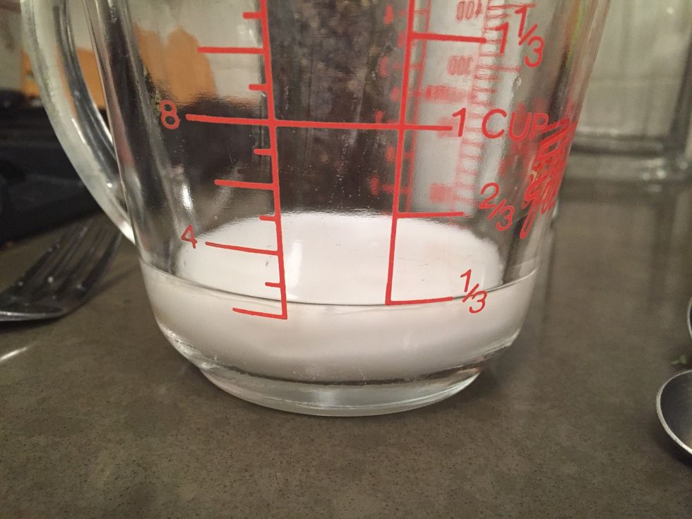 Add your chicken broth and coconut milk to a pot and turn heat to medium.