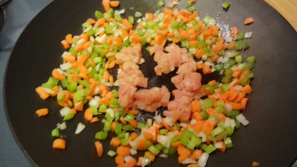 Add your chicken into the center of the pan(because it is the hottest), and cook 3-4 minutes or until chicken is no longer pink.