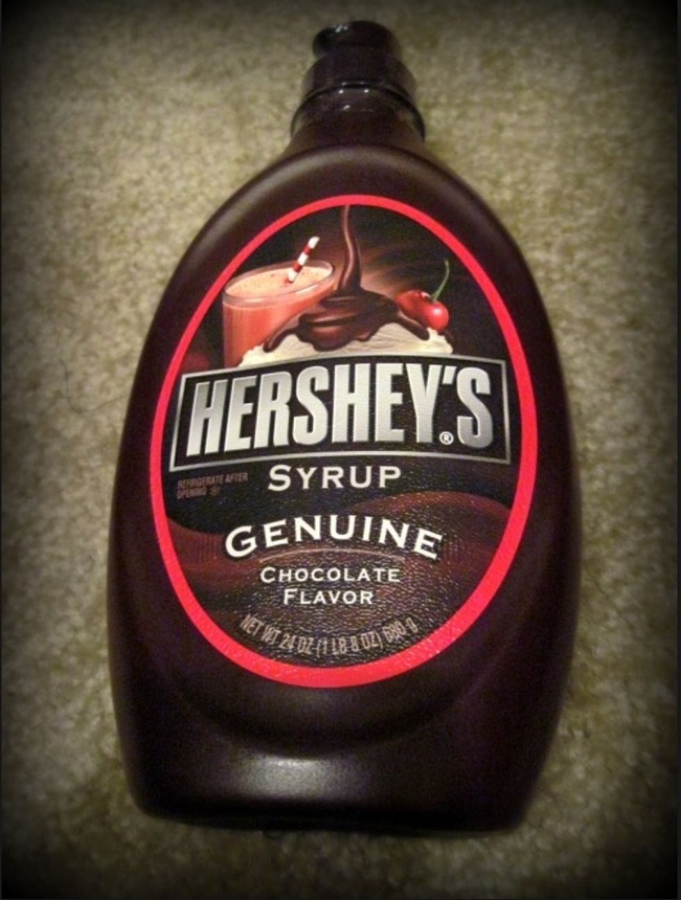 Add your chocolate syrup to your cup.