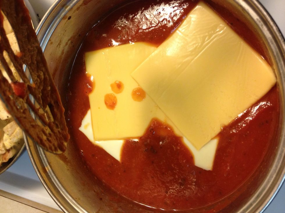 Add your choice/amount of cheeses to the sauce. We chose white & yellow American slices.