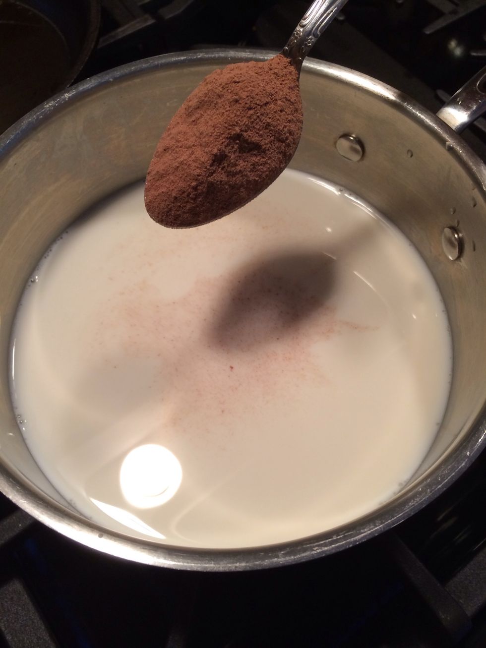 Add your choice of sweetened hot chocolate mix. In my case it's nestle quik