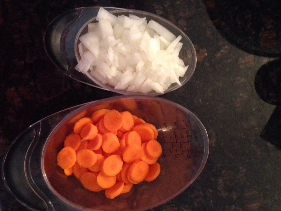 Add your chopped onions & sliced carrots to the pot.