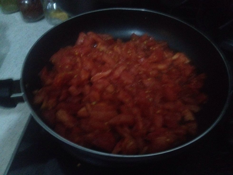 Add your chopped tomatoes to a separate pan