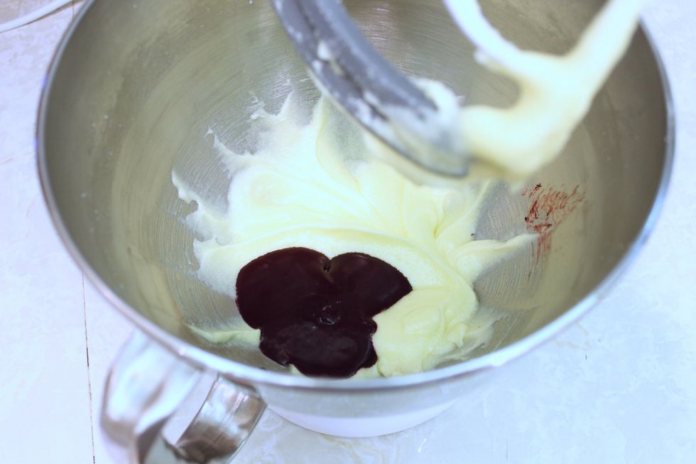 Add your cocoa mixture to the butter mixture and beat well to incorporate.