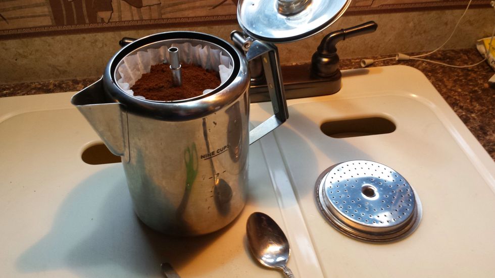 Add your coffee to the filter.