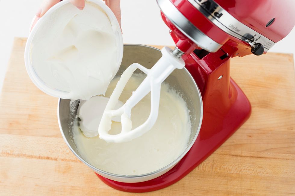 Add your cool whip topping to your cream cheese mixture. Mix to combine.