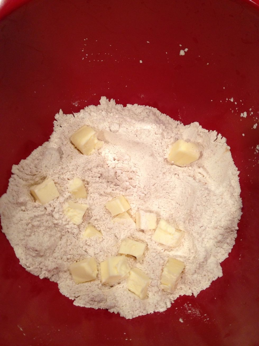 Add your cubed butter to the bowl.