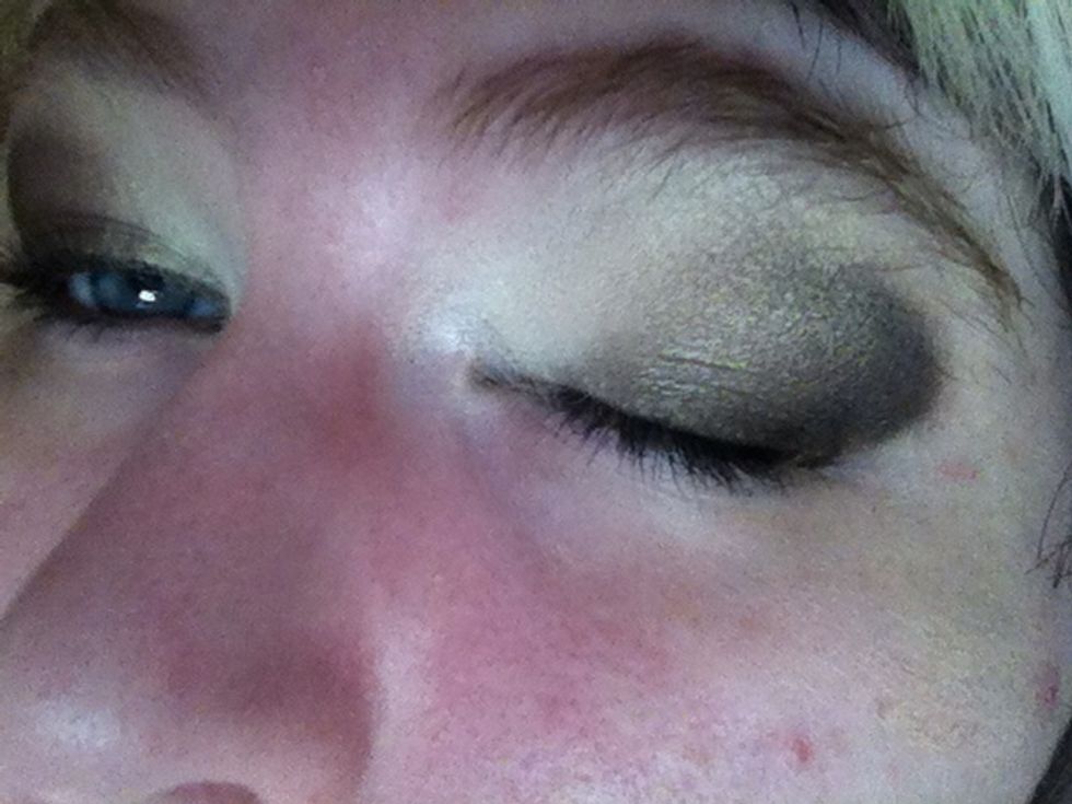 Add your dark brown on the outsides of your lid, blending with the medium brown and creating a square-like edge on the outside of your eye.