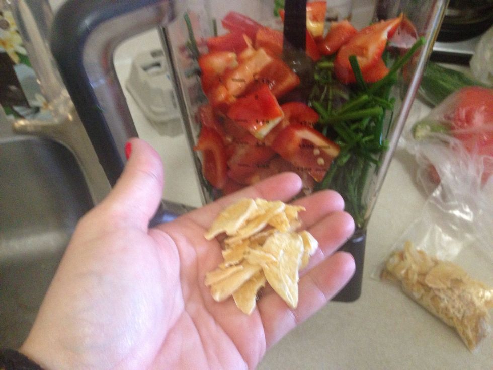 Add your dried garlic or crush fresh garlic into the blender.