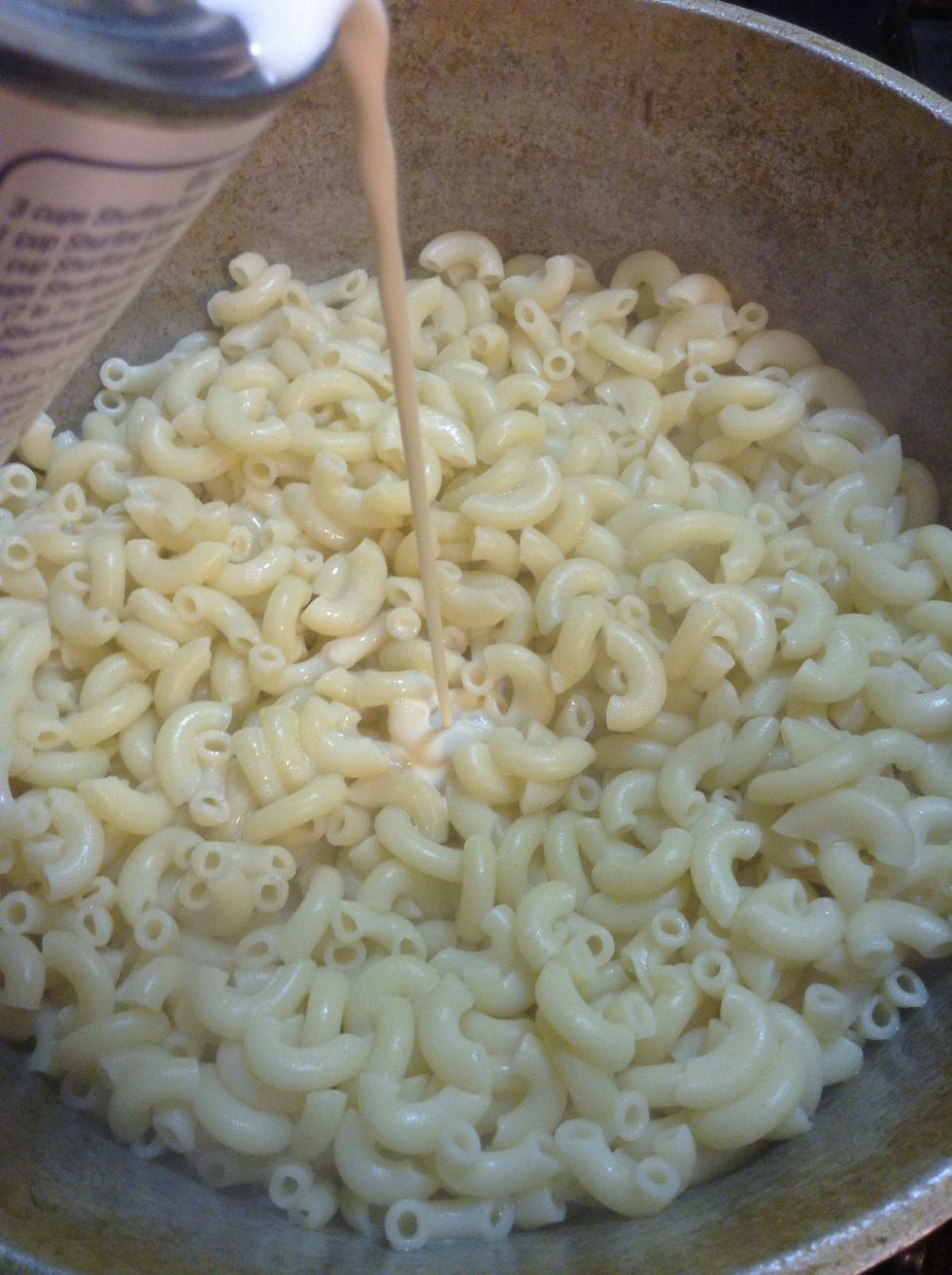 Add your evaporated milk to your cooked noodles...