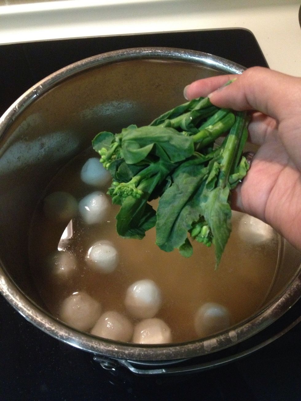 Add your fav green vege. I go with baby kai lan. Cook the noodles and vegetables in less than 20 seconds.