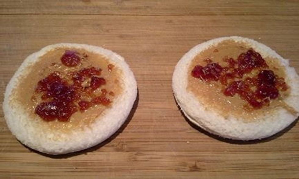 Add your favorite jelly on top of the peanut butter.