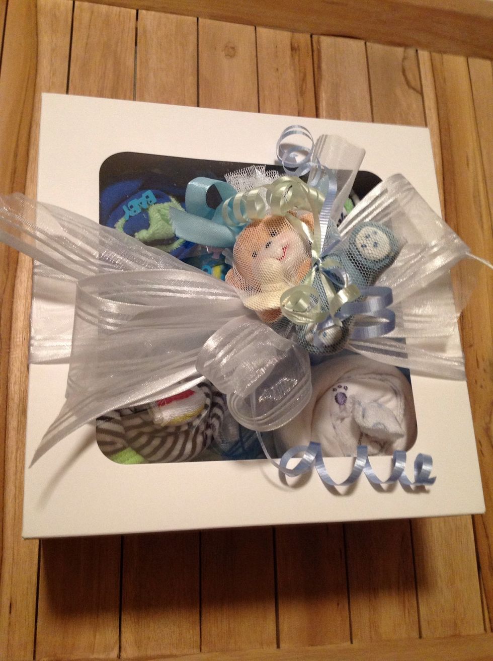 Add your favorite wrappings, ribbons or embellish with toys as you desire. A fun, personal and creative baby gift that will surely make that mommy or mommy-to -be smile with amazement!