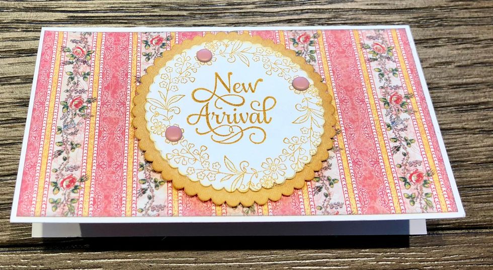 Add your focal image to the front of your invitation with foam dots.