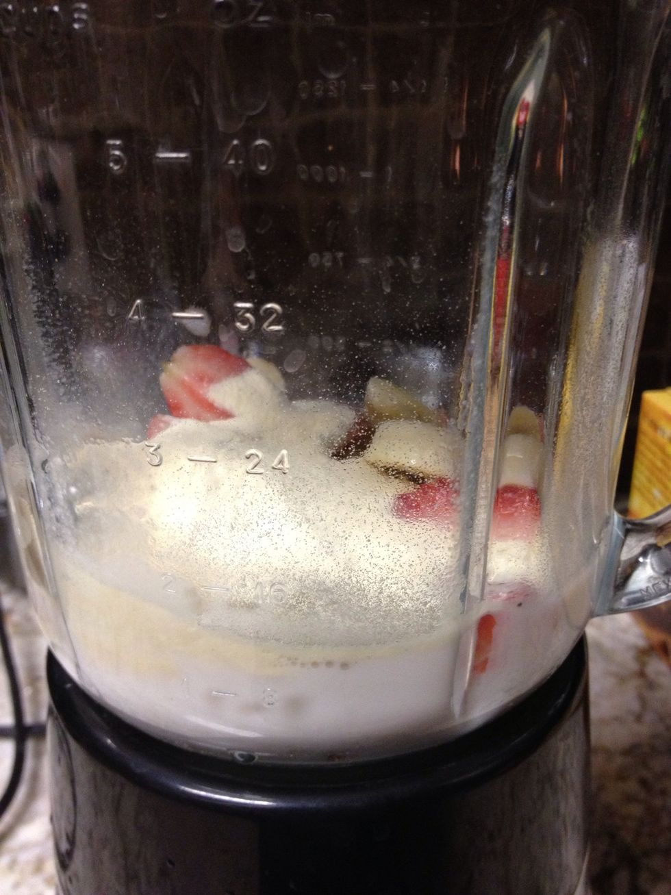 Add your fruit into the blender. And mix it for 30 seconds.