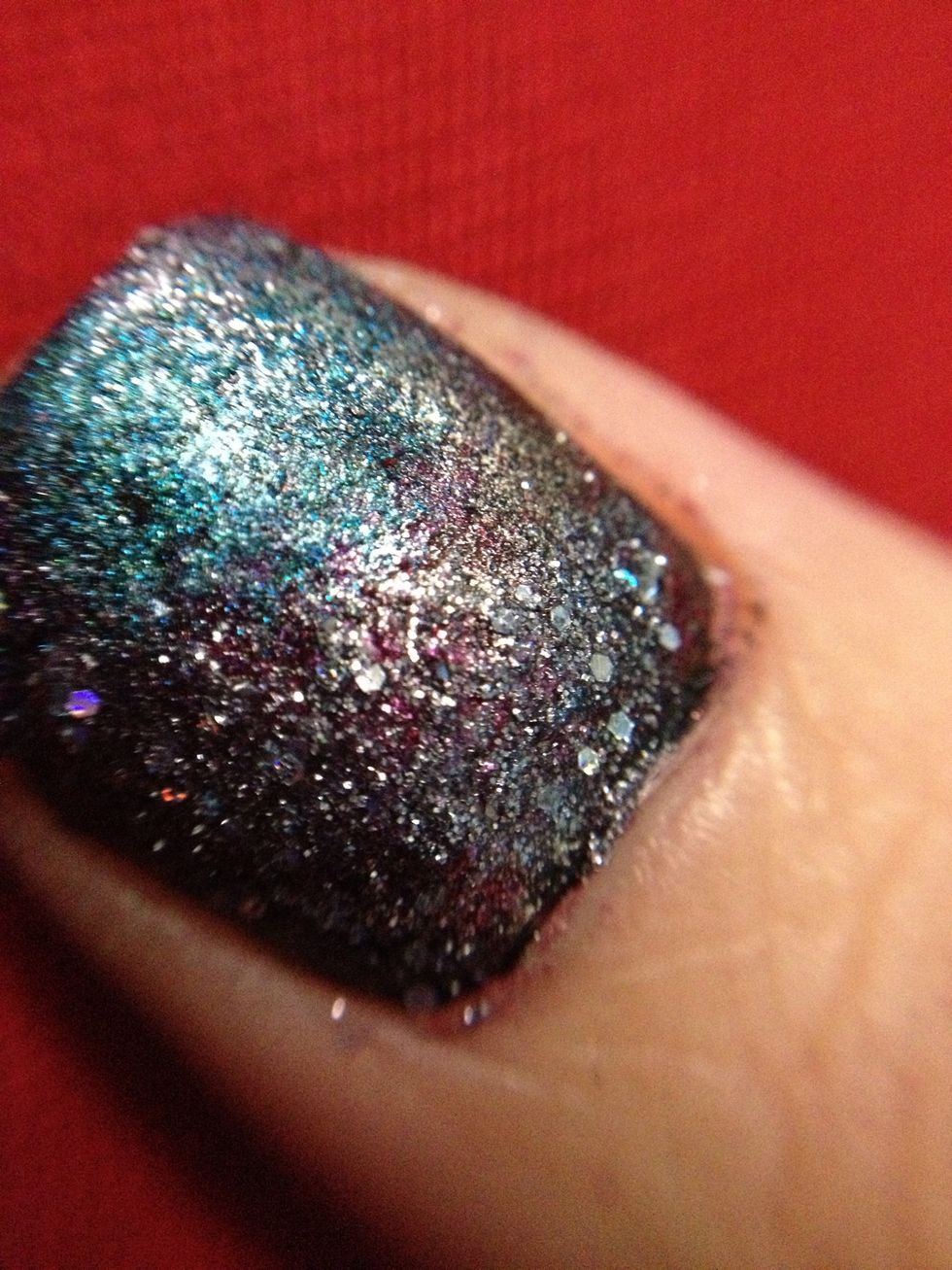 add your glitter polish. you can either sponge on or paint on. i prefer to use the sponge but either works.