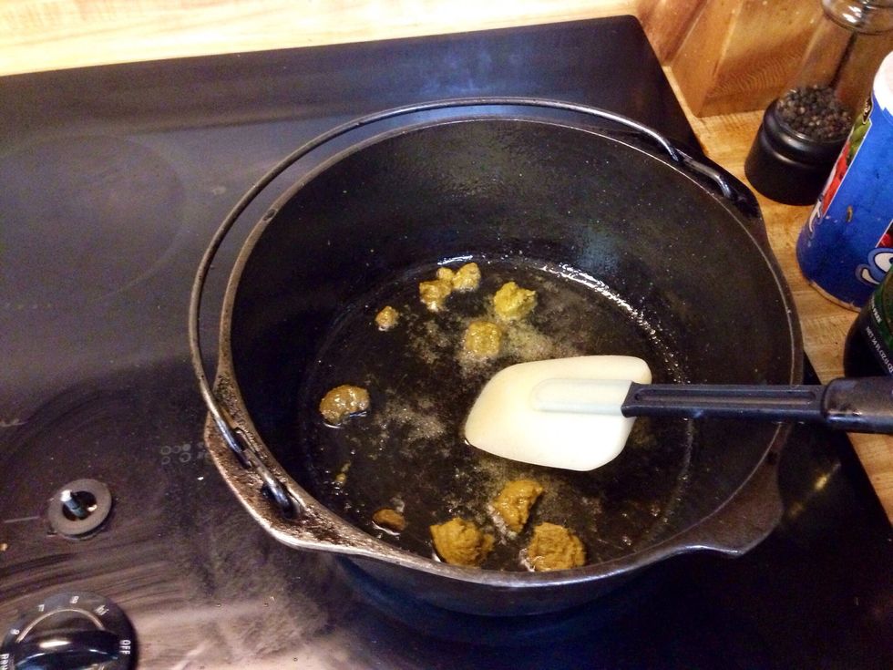 Add your green curry paste to about 2tbsp canola oil and let it cook for about 30 seconds. I would have also added the garlic and ginger at this point but I forgot :(