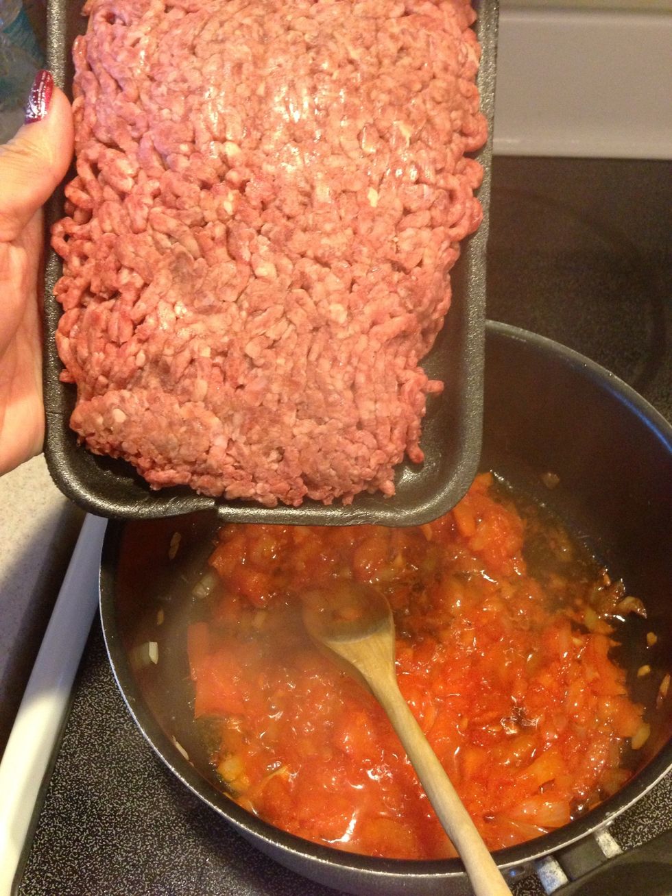 Add your ground beef and beef bouillon cube at this time...