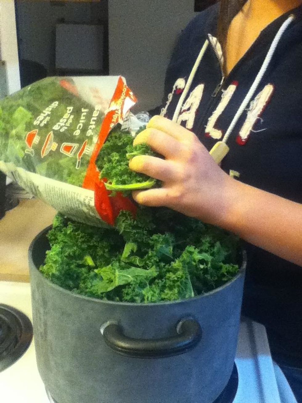 Add your kale and let it cook down. This should not take long.